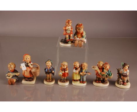 Nine mid 1960s and 1970s Goebel porcelain Hummel figures of boys and girls, including Joyful, Home From Market (AF), Book Wor