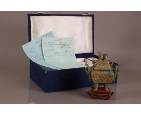 A vintage Chinese carved jadeite incense burner and cover, 16.5cm, with wooden base, box and two receipts dated 1969 a few mi
