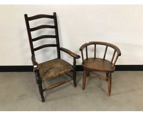 Two vintage children's chairs, one ladder back, the other with horseshoe shaped top rail (2) 