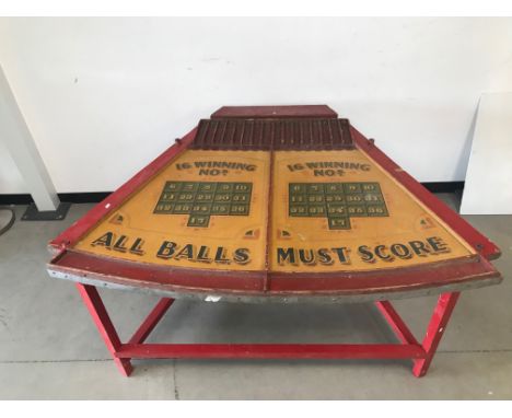 An Art Deco period fairground ball game, 162cm at its widest, tapered top with two game sections and scoring sections, AF, on