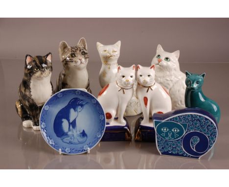 A group of seven modern pottery pussy cats, including an example from Poole, Beswick, Sidmouth and others, together with a Ca