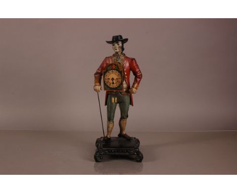 A mid 20th century spelter figural clock, 40cm, AF, modelled as a well dressed gentleman with small bracket clock to his ches