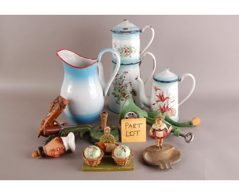 A mixed lot of kitchenalia, including three comical modern waiters, one as a doorstop, also a tin and enamel coffee perculato