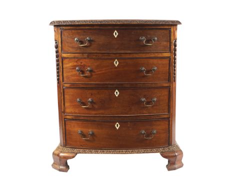 NINETEENTH-CENTURY MAHOGANY BOW FRONT CHESTof four drawers, furnished with brass handles, raised on ogee bracket feet81 cm. h
