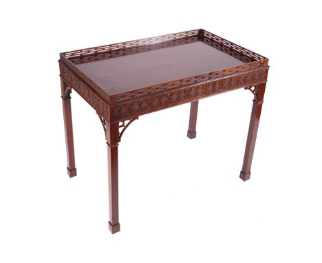 GEORGE III PERIOD MAHOGANY CHIPPENDALE SILVER TABLE, CIRCA 1780 the rectangular shaped top, below a pierced fretwork gallery 