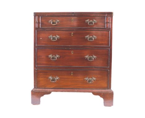 EIGHTEENTH-CENTURY PERIOD MAHOGANY BACHELOR_S CHEST, CIRCA 1770the rectangular fold over top, supported by brushing slides, o