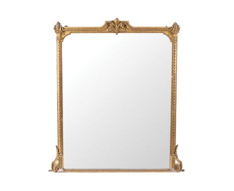 NINETEENTH-CENTURY GILT FRAMED OVER MANTLE MIRRORthe rectangular plate with serpentine corners to the top, within a scale mou