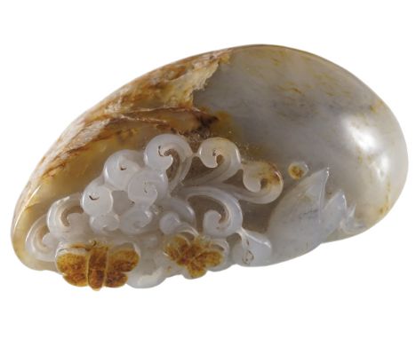 CHINESE CARVED JADE PEBBLEdecorated with a perched bird7 cm. long