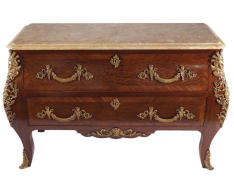 LOUIS XV STYLE ORMOLU MOUNTED WALNUT AND CROSSBANDED COMMODE the veined cream marble top, above two long drawers, between bom