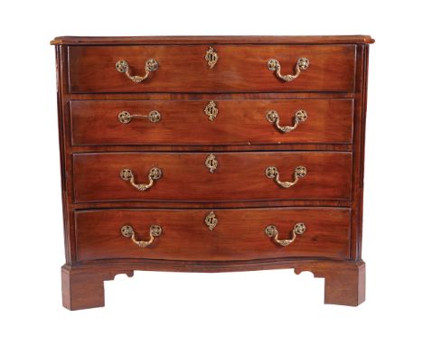 EIGHTEENTH-CENTURY PERIOD MAHOGANY CHIPPENDALE SERPENTINE FRONT COMMODEof four drawers, furnished with ornate scroll handles 