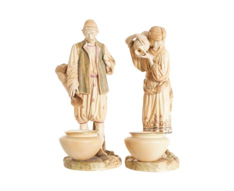 PAIR OF LARGE ROYAL WORCESTER PORCELAIN FIGURESrepresenting water carriers32 cm. high (2)