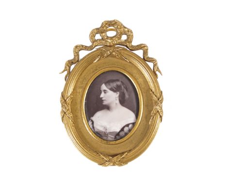 PORTRAIT MINIATURE IN AN ORNATE ORMOLU FRAME Provenance: Property of the late Elizabeth O_Kelly, formerly of The Dower House,