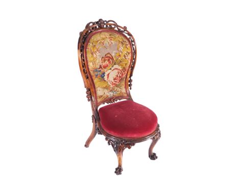 NINETEENTH-CENTURY ROSEWOOD AND TAPESTRY UPHOLSTERED LADIES CHAIRthe upholstered balloon panelled back within a moulded and p