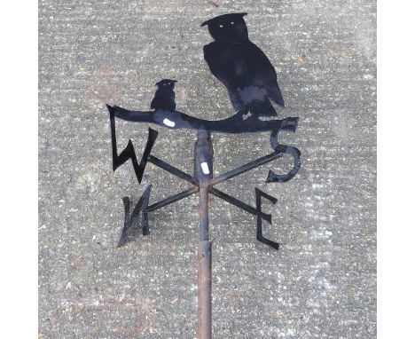 A metal weather vane, surmounted by two owls, 320cm long overall