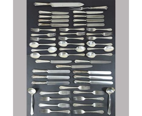 An early 20th century silver table service, comprising nine table forks, nine table knives with steel blades, nine dessert fo