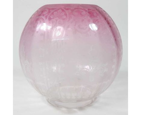 A pink glass oil lamp shade, with etched decoration, 19cm high