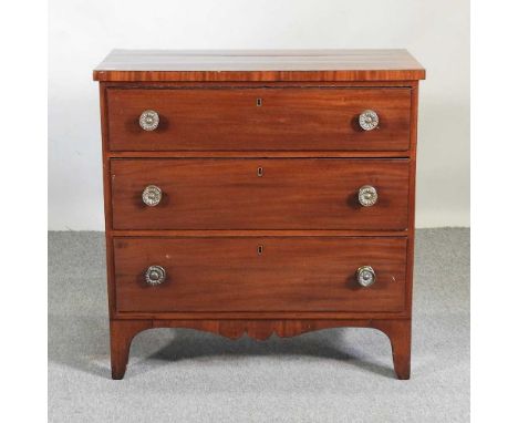 A Regency mahogany chest, containing three long drawers, on bracket feet84w x 44d x 85h cm