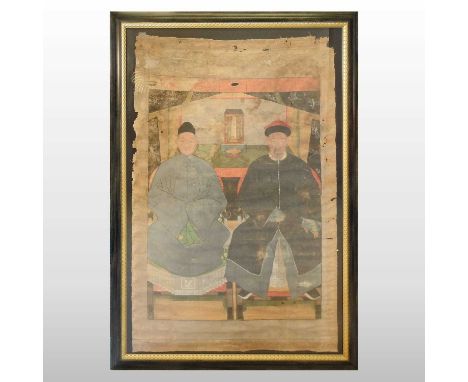 Chinese school, Qing dynasty, an ancestral portrait of a couple dressed in robes, seated in an interior, gouache on canvas, 1