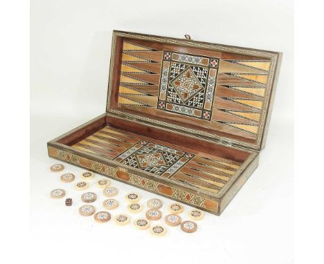 An Indian sadelli inlaid wooden backgammon set, 50cm