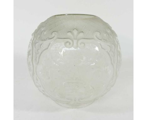 An etched glass oil lamp shade, with moulded decoration, with a four inch fitting, 19cm diameter