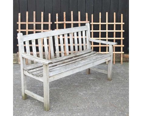A wooden garden bench, together with three garden trellis (4)144w x 55d x 87h cm