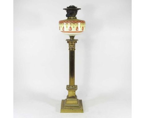 An early 20th century brass column oil lamp, with a painted opaque glass font and Duplex burner, 71cm highCondition report: O