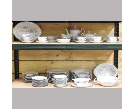 A Japanese white glazed part tea and dinner service, mid 20th century, decorated with landscapes