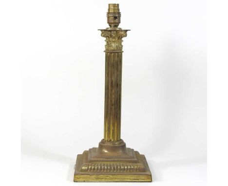 A mid 20th century brass corinthian column table lamp base, with a fluted column, 38cm high