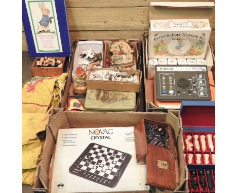 Three boxes of vintage toys and games, to include tinplate toys, chess sets, a Binatone television game, a Wedgwood Peter Rab