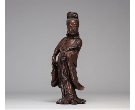 Guanyin carrying a carved wooden Ruyi sceptre from the Qing period (æ¸…æœ). The guanyin represents compassion in East Asian B