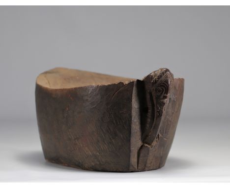 Batak Sumatra Mortar in the shape of Hombung chests, carved on the front with a representation of Singa. Provenance: P. Gilma