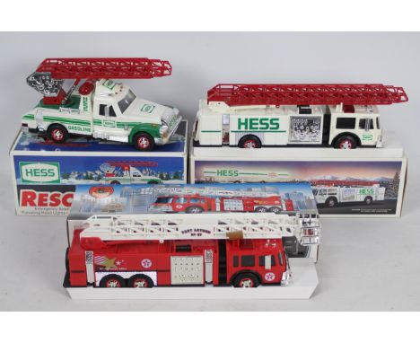 Hess (Gasoline) - Three boxed plastic battery operated 1:35 scale US Fire and Rescue Trucks / Appliances from Hess. Lot consi