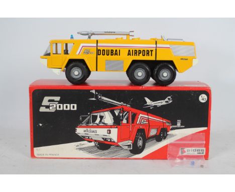 CEF - A boxed 1:43 scale diecast CEF Sides S2000 Ultra Heavy Foam Crash Tender. The model in Dubai Geneva Airport livery, app