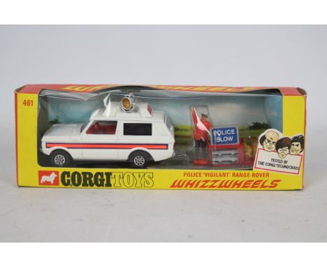 Corgi - A boxed Corgi #461 Police 'Vigilant' Range Rover'. The model in white with red interior, black side panels, roof ligh