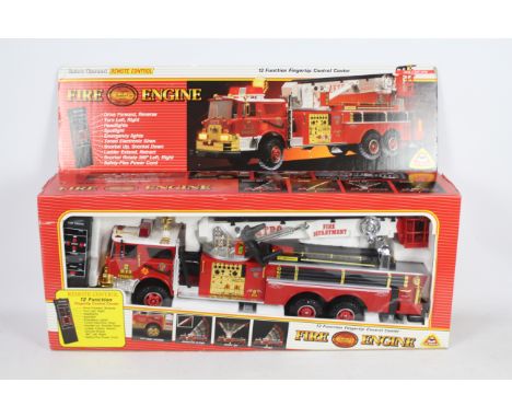 New Bright - A large New Bright #230 battery operated Remote Control New York Fire Department Fire Engine. The model appears 
