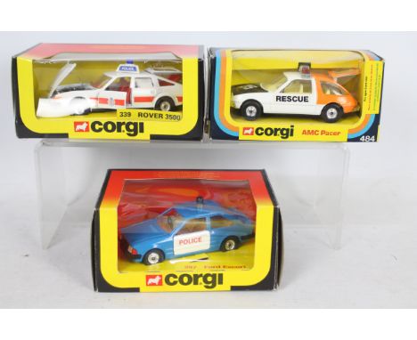 Corgi - Three boxed diecast Corgi 'Police /Emergency' diecast model cars. Lot consists of Corgi #484 AMC Pacer 'Rescue'; #297