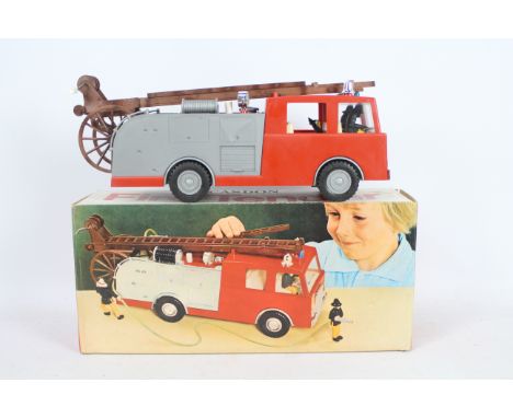 Casdon - A vintage Casdon #178 Fire Tender with Pull Along Alarm System. The large plastic model appears to be in Excellent c