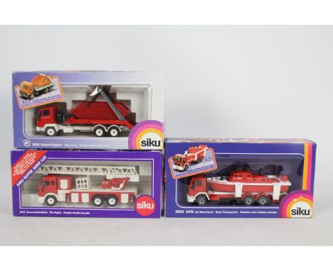 Siku - Three boxed 1:50 and 1:55 scale diecast European Fire Appliances from Siku. Lot includes #3433 Mercedes Fire Engine; #