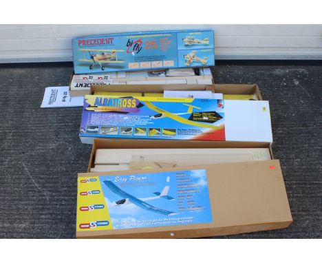 Two boxs containing model making wood and an Albatross model airplane (no engine).