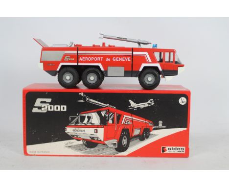 CEF - A boxed 1:43 scale diecast CEF Sides S2000 Ultra Heavy Foam Crash Tender. The model in Geneva Airport livery, appears t