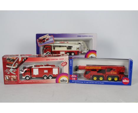 Siku - Three boxed 1:50 and 1:55 scale diecast European Fire Appliances from Siku. Lot contains Siku #2110 1:55 Faun Fire Eng