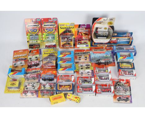 Matchbox, Matchbox Mattel - Over 30 boxed and carded predominately Matchbox diecast fire engines and fire related vehicles, f