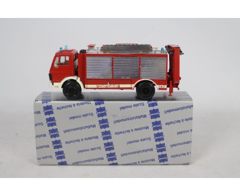 Conrad - A boxed 1:50 scale Conrad #3090 Mercedes Rosenbauer RFC-11 Fire Engine. The model in red appears to be in Mint condi