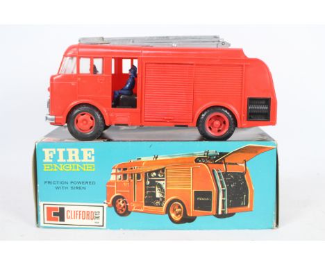 Clifford Toys - A boxed plastic friction powered Clifford Toys #6083 Dennis Fire Engine. The model appears to be in Very Good