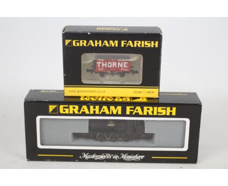 Graham Farish - Bachmann - a boxed 0-6-0 J94 Saddle Tank engine in BR black livery # 372-503 and an 8 plank end door wagon in