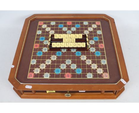Franklin Mint - Scrabble - 24ct gold plated collectors edition with swivel plate on the bottom. , Item appears in used fair c