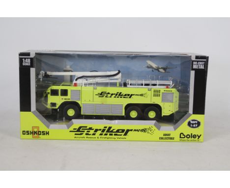 Boley - A boxed 1:48 scale Boley #6001-88 Oshkosh Striker Aircraft Rescue &amp; Firefighting Vehicle. The diecast model appea
