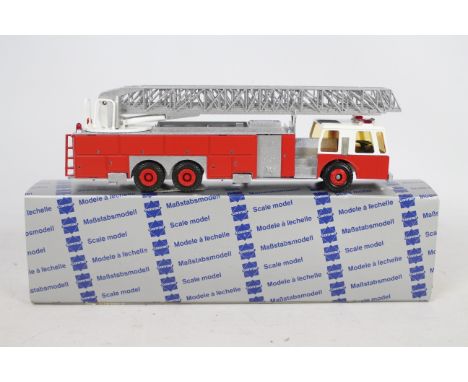 Conrad - A boxed 1:50 scale Conrad #5504 Emergency One Turntable Ladder Fire Engine. The model in red appears to be in Mint c