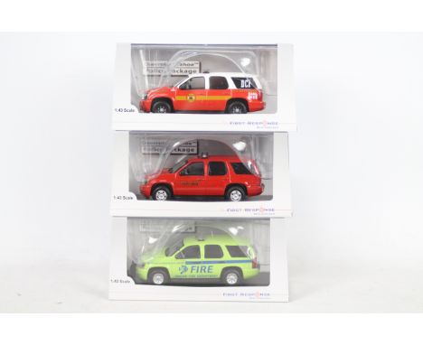 First Response Replicas - Three boxed diecast Chevrolet Tahoe 1;$3 diecast model Fire vehicles from First Response Replicas. 