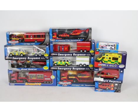 Teamsters, John-Toy - 12 boxed diecast Emergency vehicles in various scales. Lot includes John-Toy 'Alarm 1-1-2 Scania Crane 